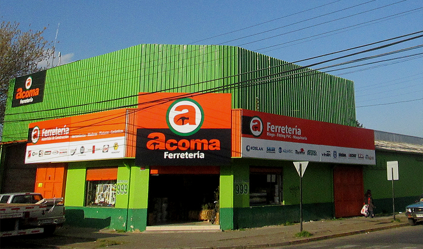 Edificio de Ferretería ACOMA en Chillán, con fachada verde y naranja y letrero de Ferretería