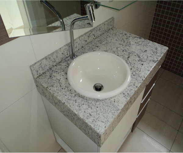 Bancada em granito branco com cuba redonda de louça