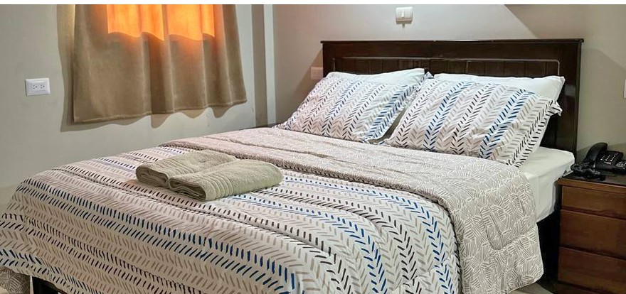 Habitación con cama matrimonial del Hotel Euro Maracaibo