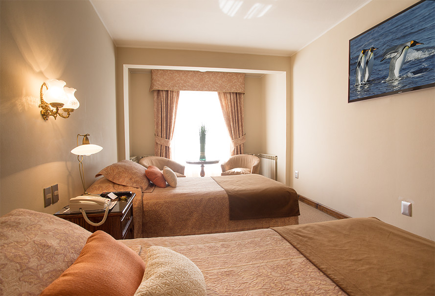 Habitación Doble del Hotel Tierra del Fuego con dos camas individuales