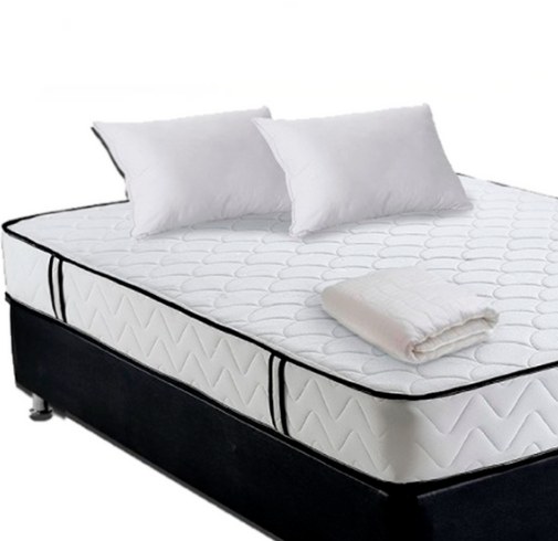 Colchón doble pillow con almohadas y cobija doblada, Muebles Medellín