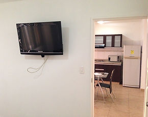 Apartamento de la Posada Churum Merú con TV y acceso directo a una cocina equipada