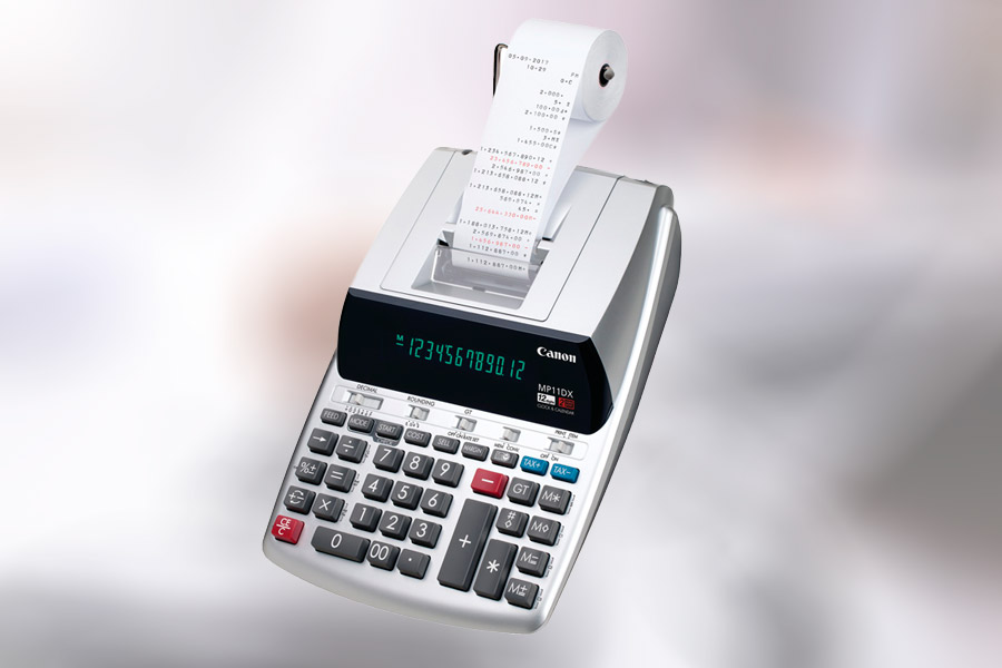Calculadora sumadora de oficina marca Canon con rollo de papel impreso